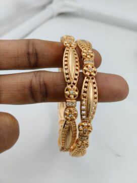 Gold Plated Oval Panel AD Stone Bangle Pair | Floral CNC Jali Design