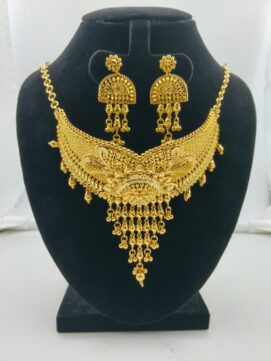 Regal V-Shaped Gold-Plated Choker with Ornate Floral Medallion and Drop Earrings